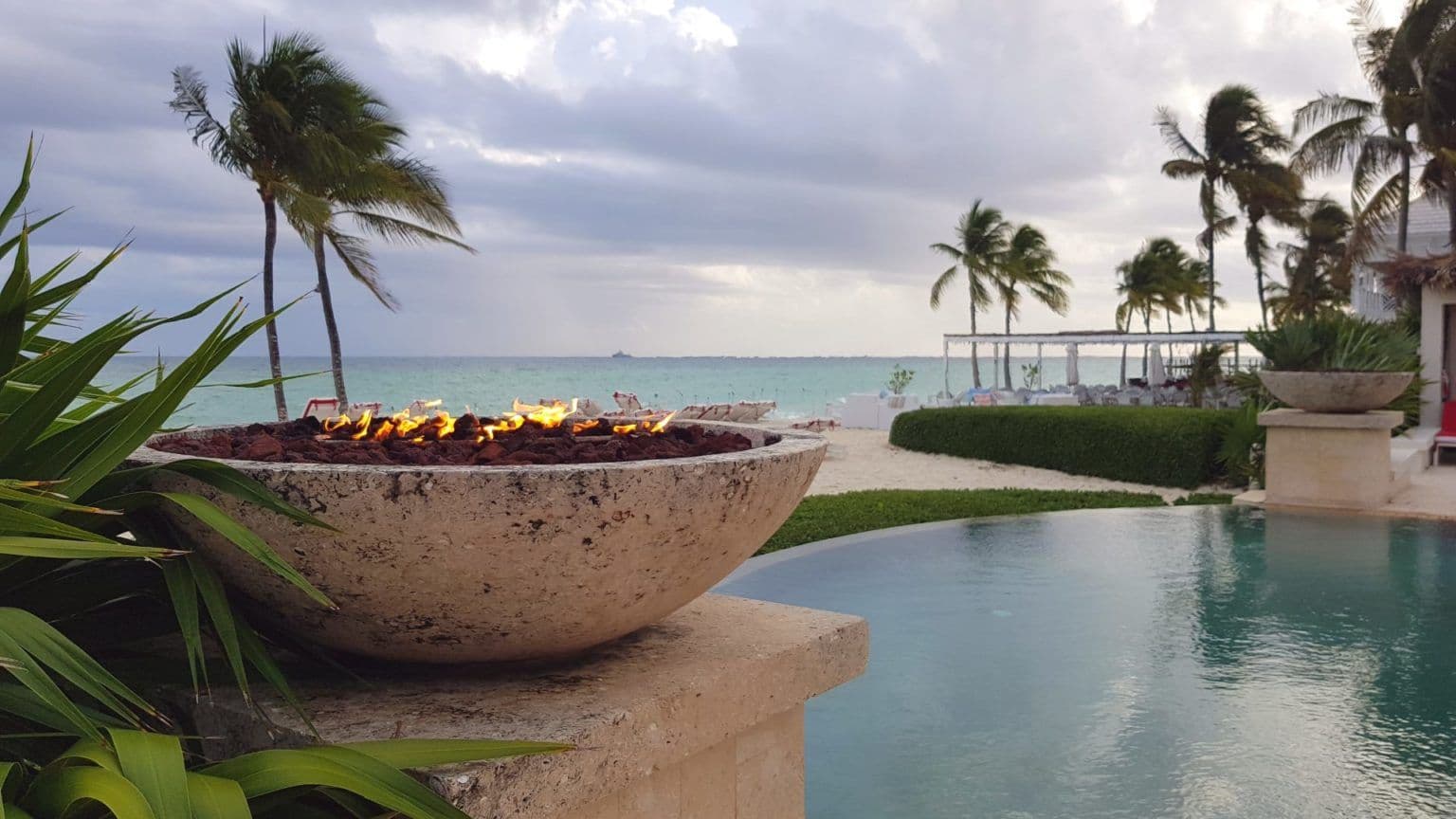 banner-gas-fired-fire-put-beside-pool-and-beach-1536x864