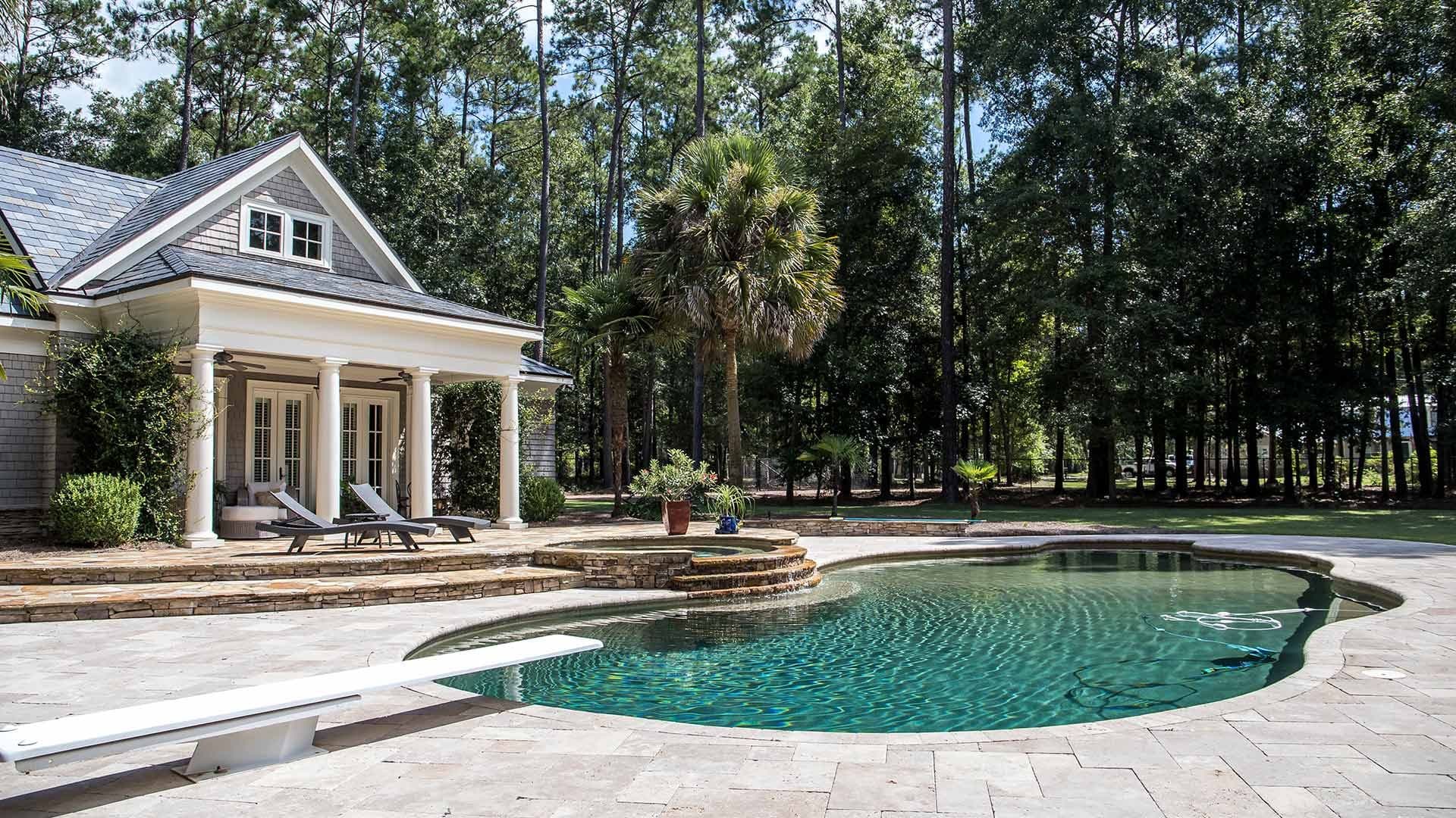 banner-home-with-natural-stone-paved-deck