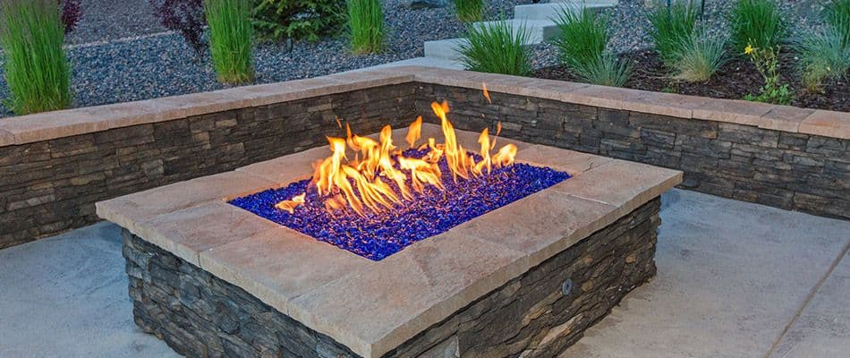 content-fire-pit-encased-by-a-seating-wall