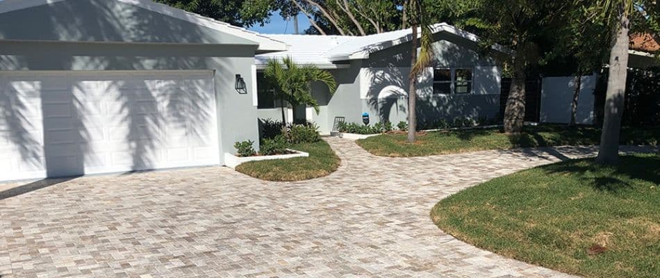white-stone-pavers-for-driveway-installed